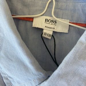 Three boys Hugo boss shirts one Ralph Lauren